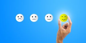 conceptual the customer responded to the survey the client using hand choose happy face smile icon cuinsight choose happy face smile icon cuinsight