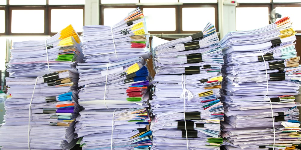 bigstock-Stack-Of-Business-Papers-88335854