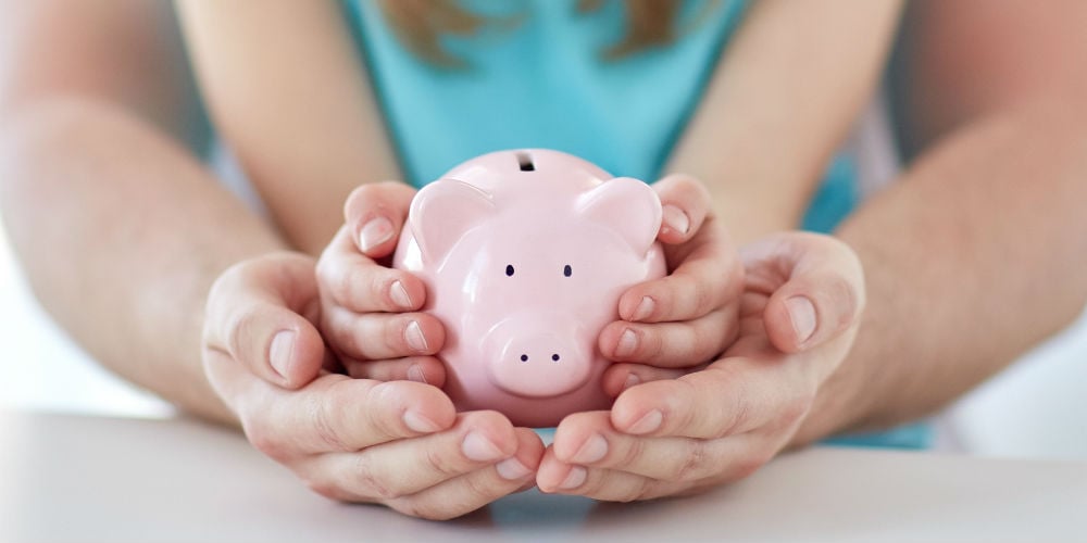 bigstock-family-children-money-inves-88061969
